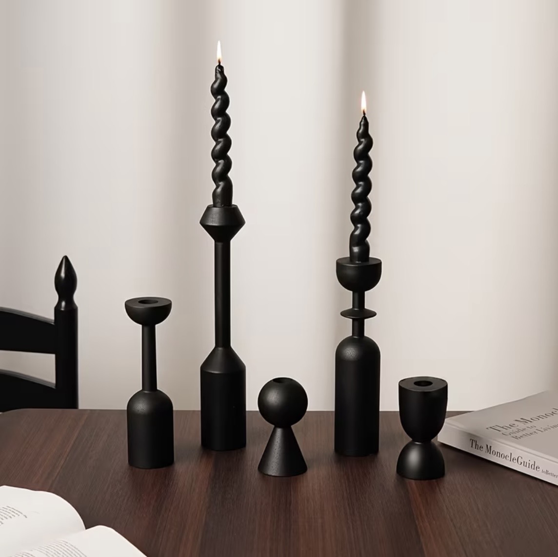 Matte black geometric candle holders with black spiral taper candles