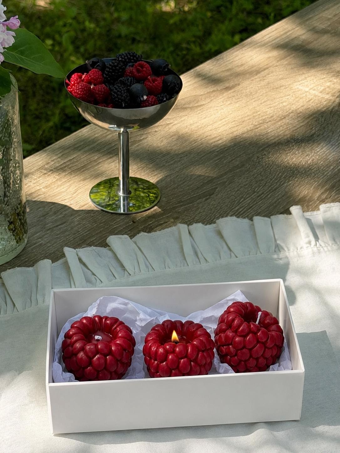 Raspberry Candle — A berry-inspired candle with rounded detail.