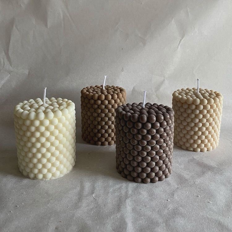 Bubble Pillar Candle — A substantial pillar finished in a field of bubbles.