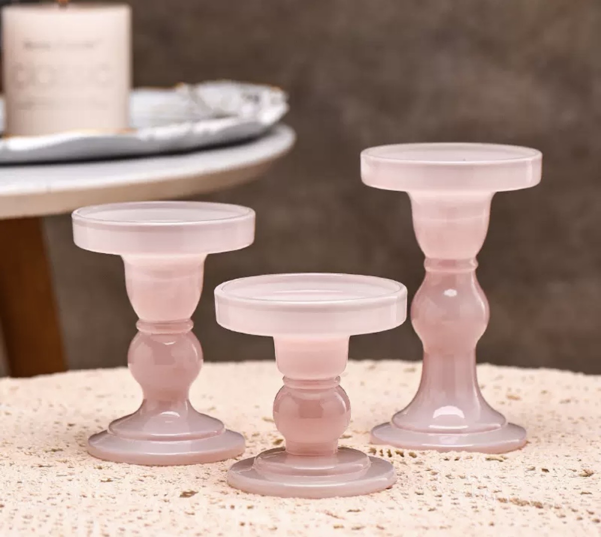 Blush pink glass pillar candle holders in three sizes
