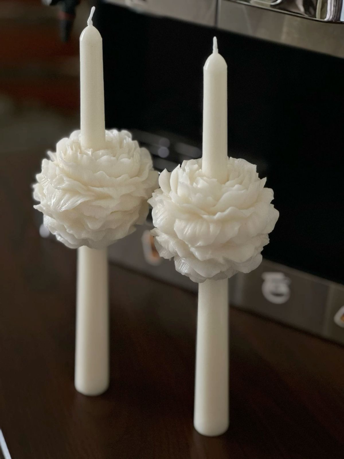 Peony Taper Candle Pair — Slender tapers framed by full peony blooms.