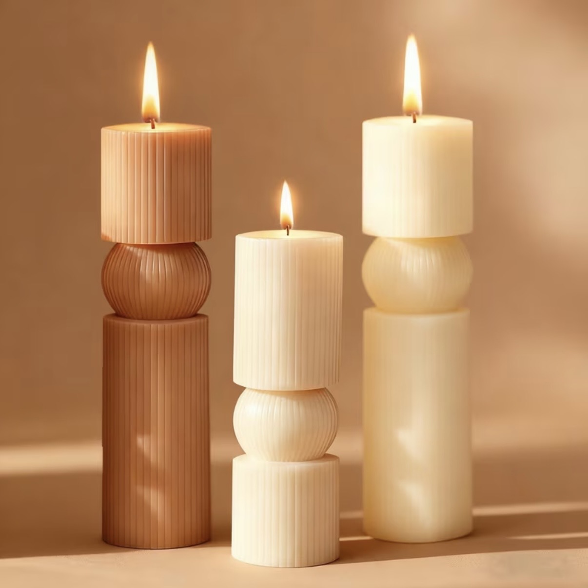 Geometric Balance Pillar Candle — Balanced cylinders and spheres in a modern pillar.
