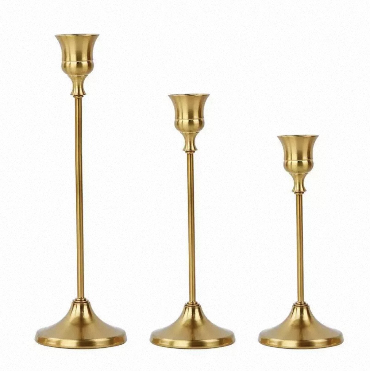 Classic brass tulip-top candlesticks in three heights