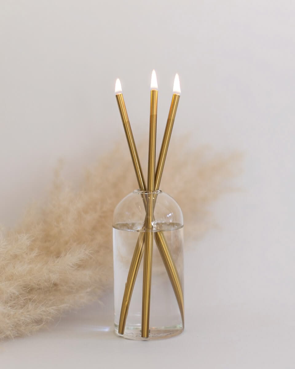Warm brass Everlasting Taper Set in a clear glass flacon