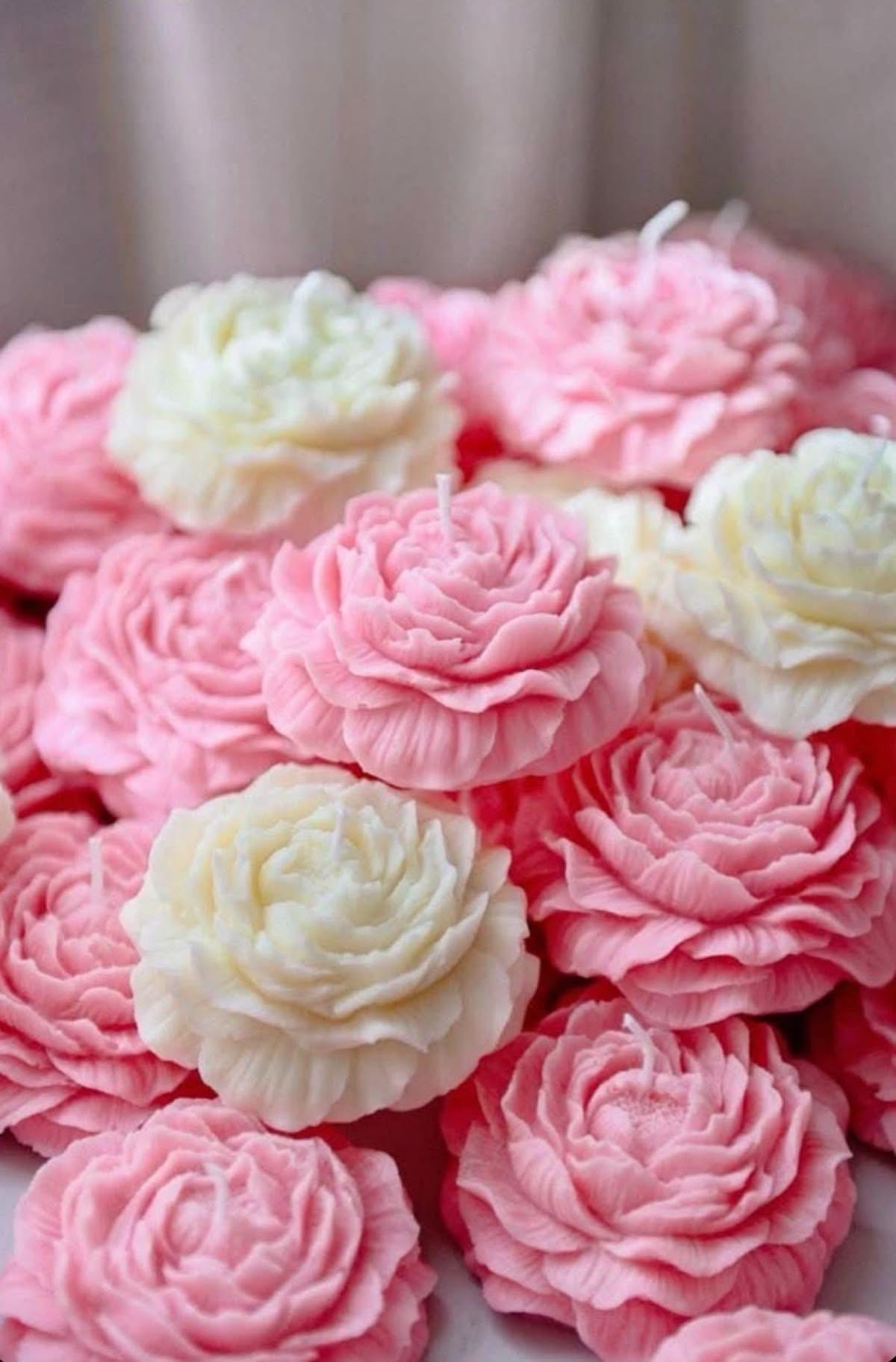 Rose Candle — Sculpted roses in blush and cream.