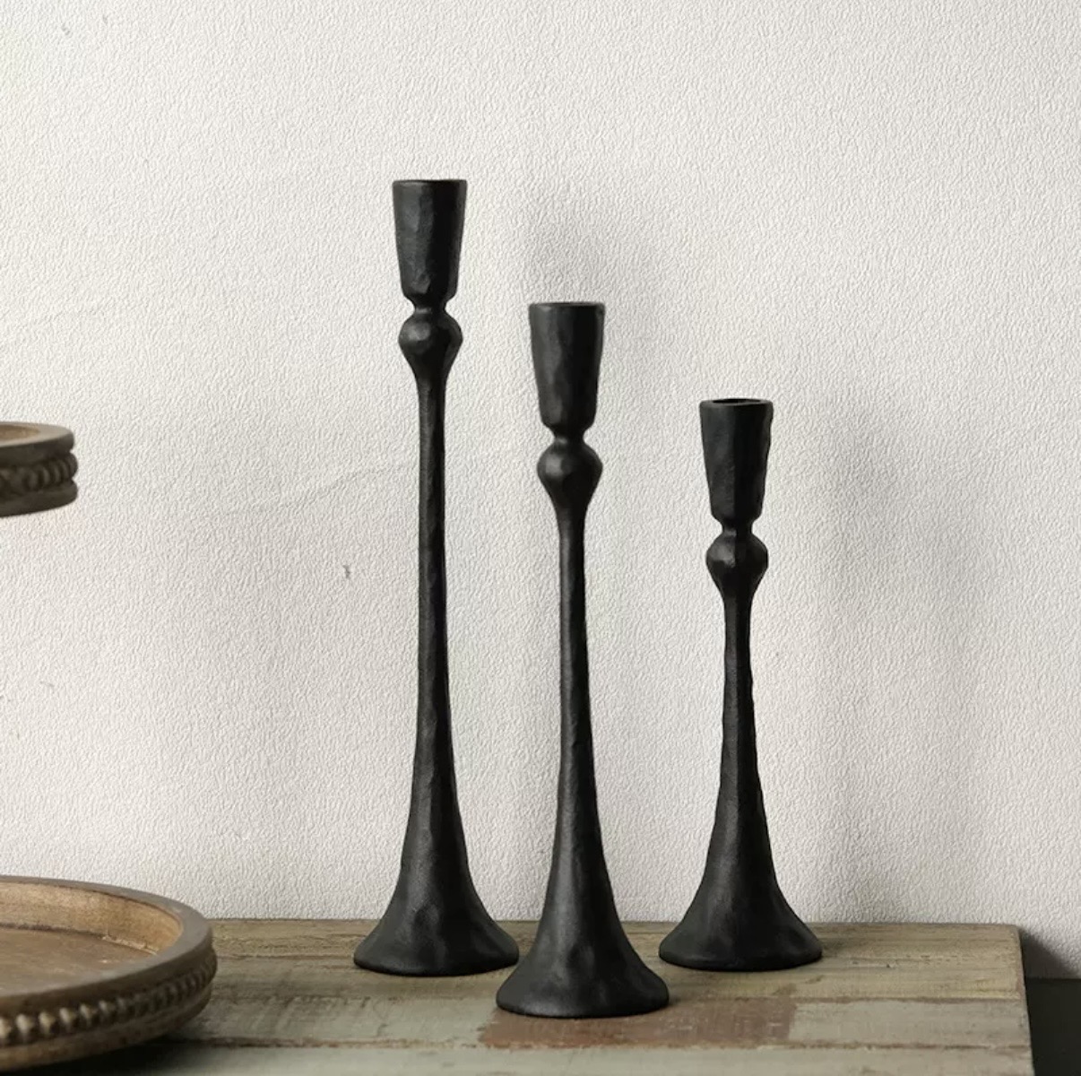 Matte black hammered tulip candlesticks in three heights