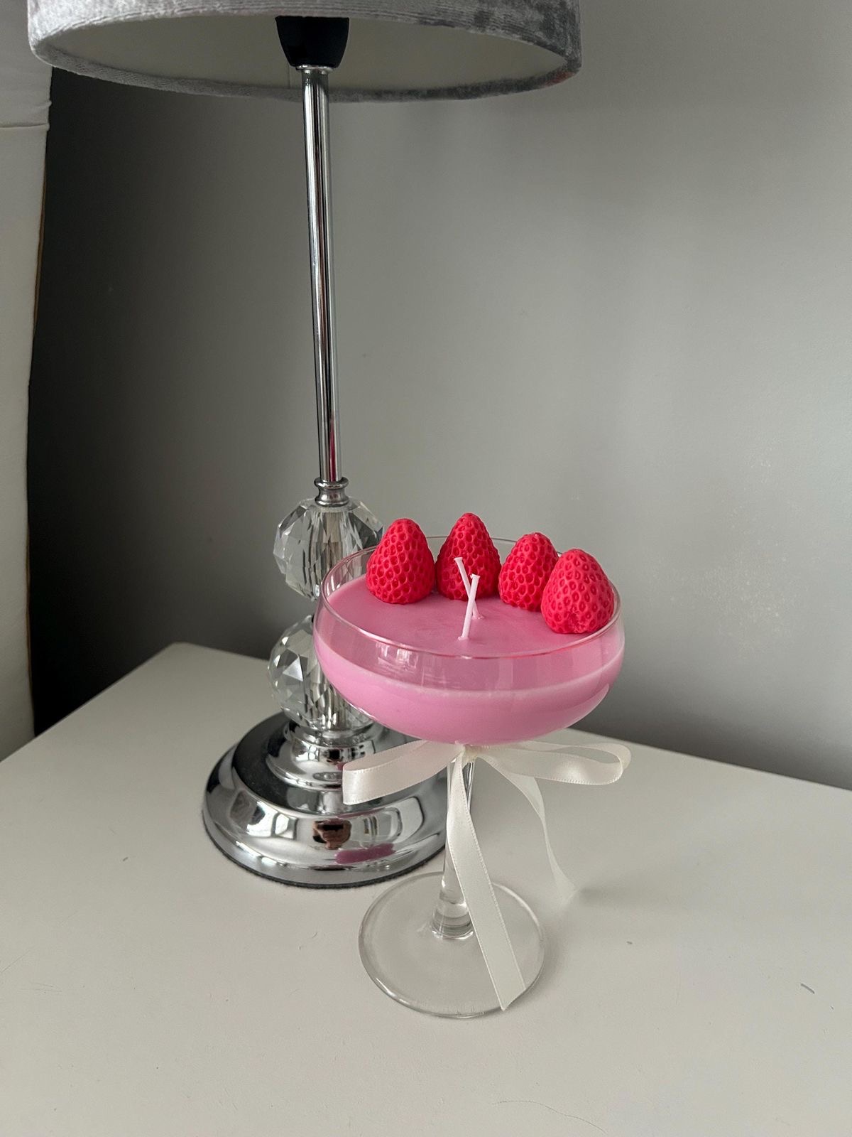 Pink Berry Coupe Candle — Soft pink pour with sculpted berries and an ivory bow.
